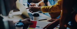 Shot of hands in brainstorming session