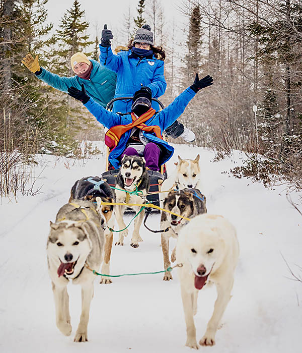 The authorās first time dogsledding. The ride was called tongue-in-cheek āididamileā (I did a mile.)