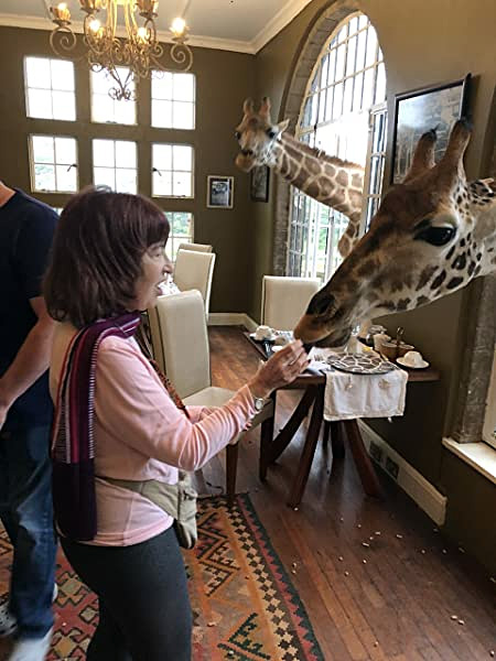 Rozanne Feeding Giraffe