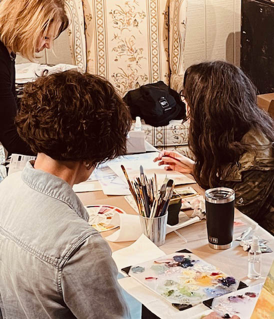 art students at work table